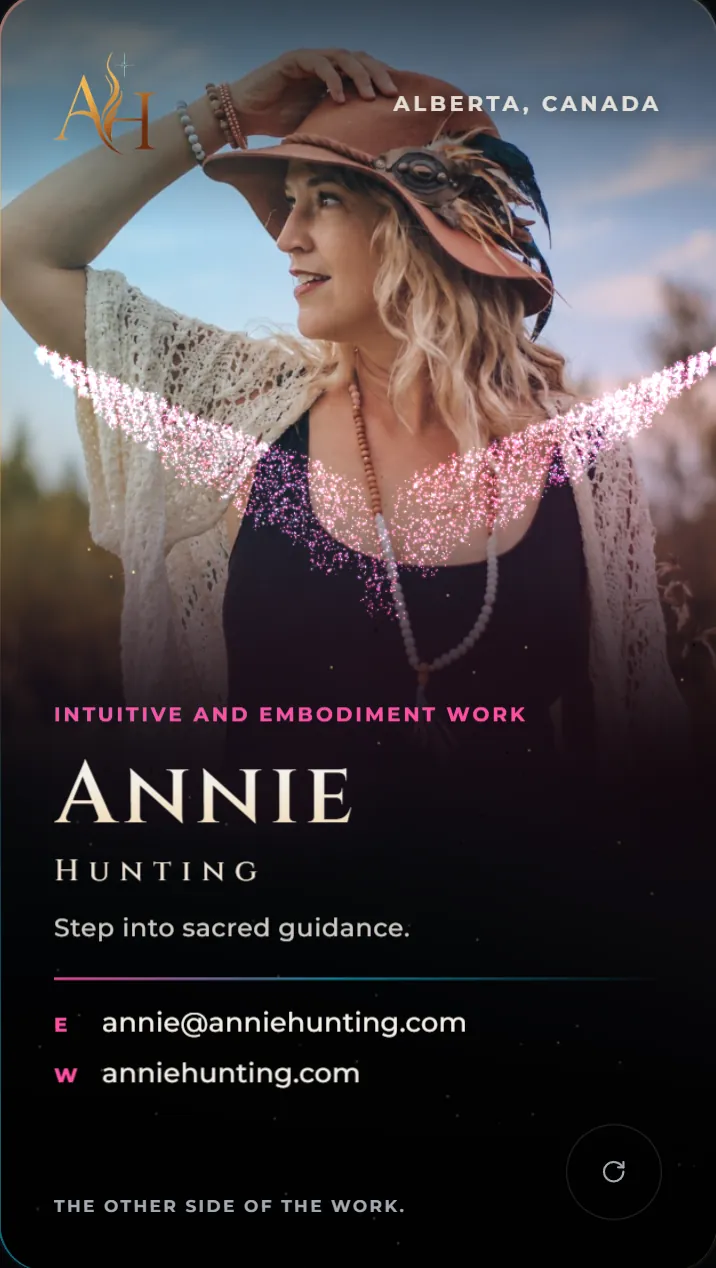 Annie Hunting's card: her portrait with glowing pink wings